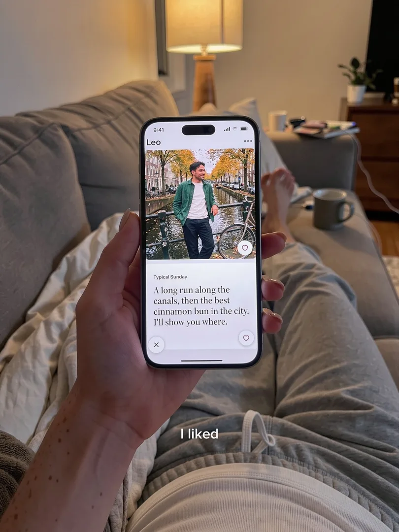 The remake slide with the words I liked over a phone in her hand
