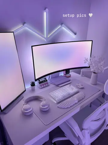 Purple-lit desk setup with small text: setup pics