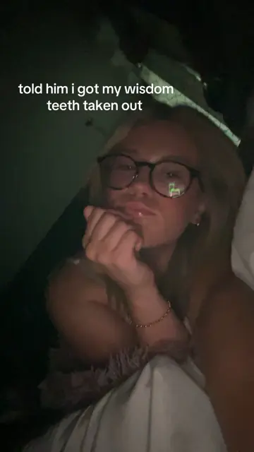 Dim selfie in glasses, text: told him I got my wisdom teeth taken out