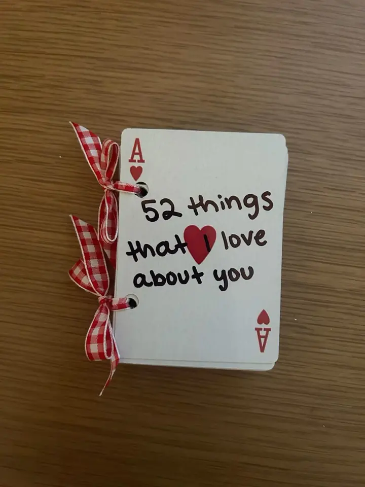 Slide 2: a deck of cards tied with gingham ribbon, top card reads 52 things that I love about you