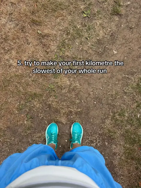 Looking down at turquoise running shoes on a dirt path, a running tip written above